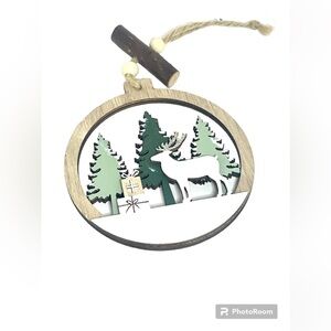 Circle Shaped Green and White Reindeer in a Forest Christmas Ornament